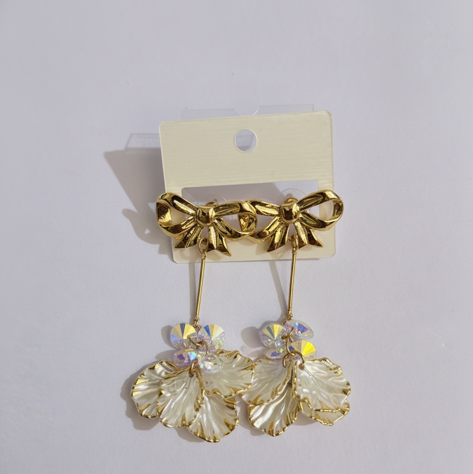 Golden Bow & Crystal Petal Dangle Earrings. MAYA LUXE.